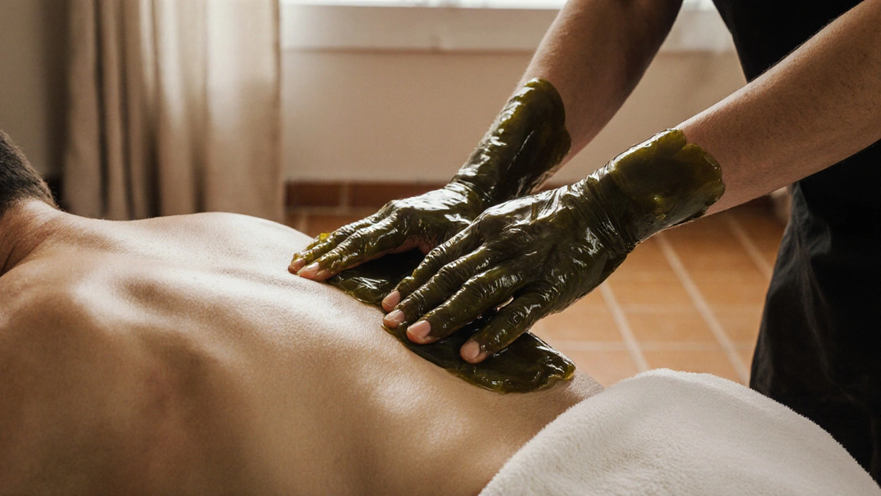 Close-up of hands and forearms in translucent gel moving smoothly over skin.